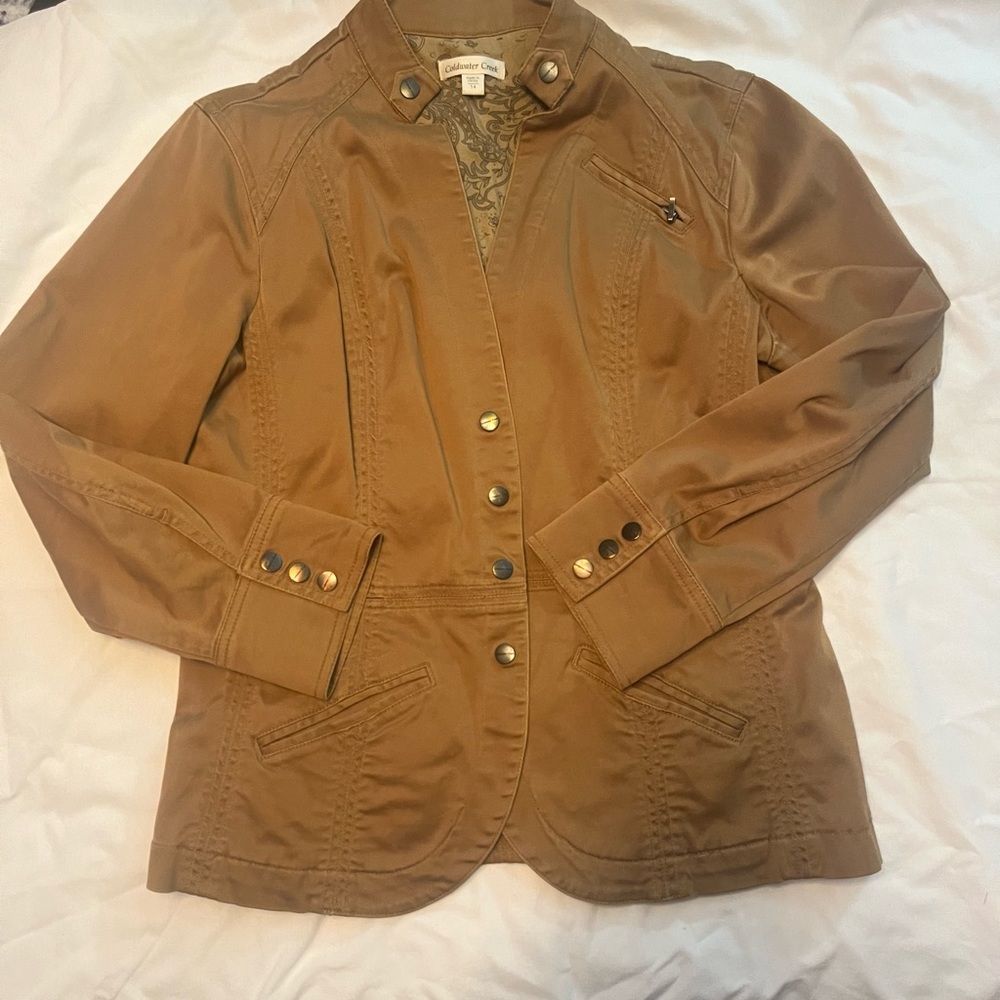 Very cute, short cotton jacket, camel colored.